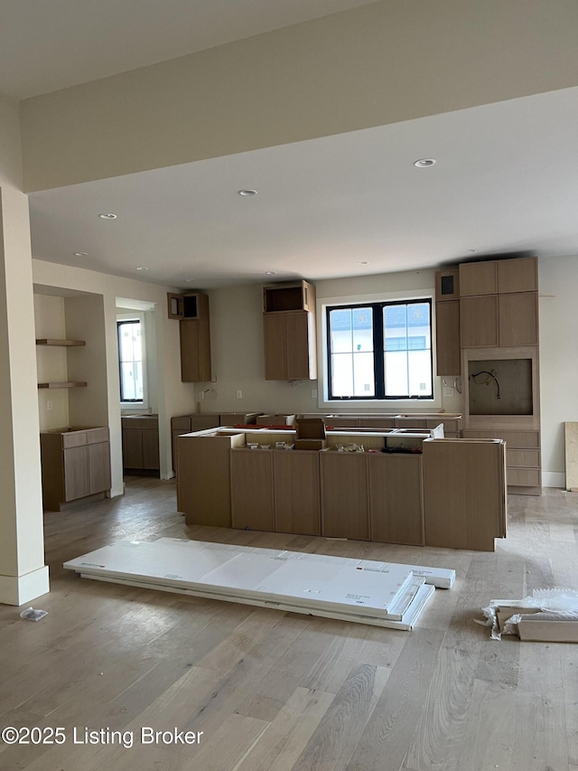 kitchen with light hardwood / wood-style flooring