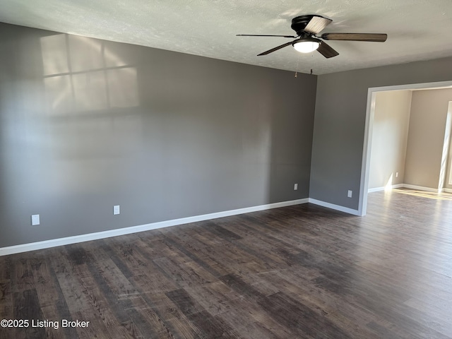 695 Johnson St, Leitchfield, KY 42754 - unfurnished room featuring ceiling fan, dark wood-style floors, and a textured ceiling