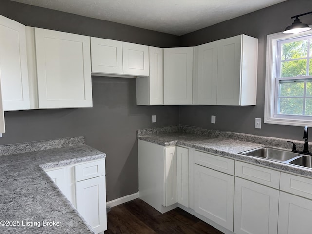695 Johnson St, Leitchfield, KY 42754 - kitchen featuring white cabinets, dark wood finished floors, and light countertops