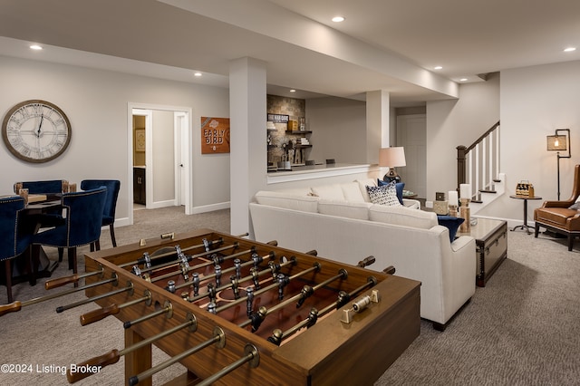 recreation room featuring carpet flooring