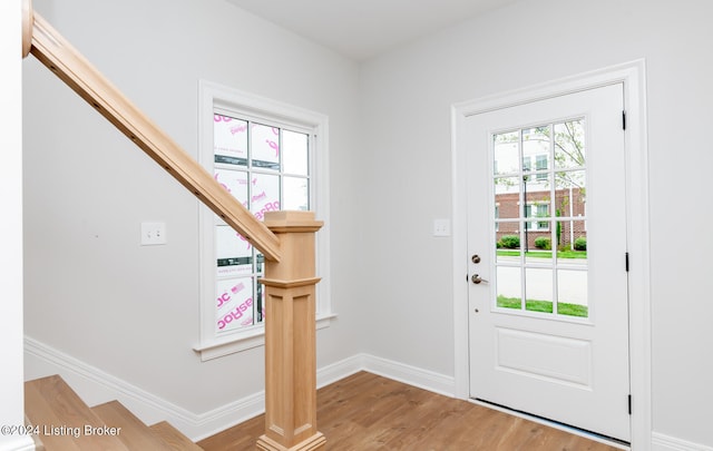 doorway to outside with light hardwood / wood-style floors