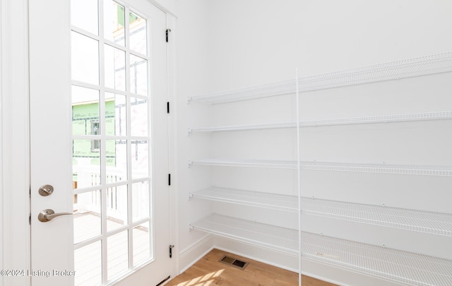 entryway with light hardwood / wood-style floors