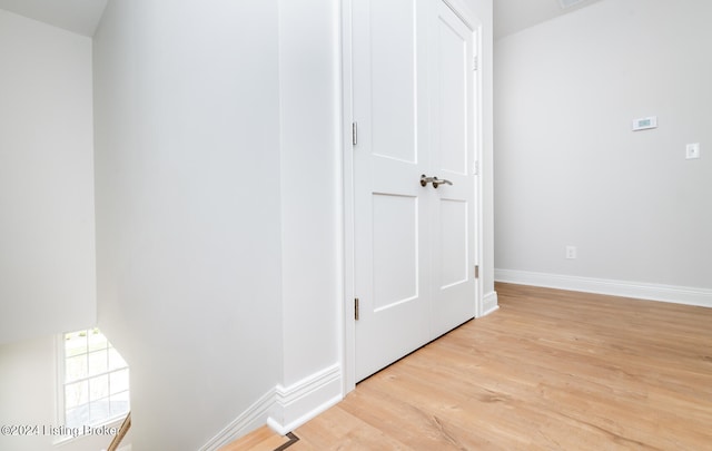 hallway featuring light wood-type flooring