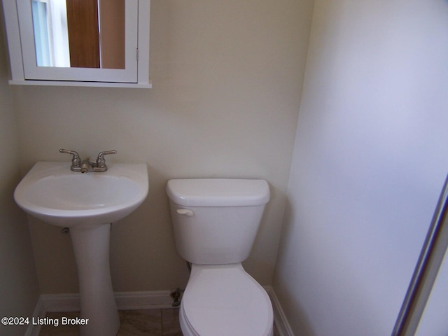 bathroom featuring toilet