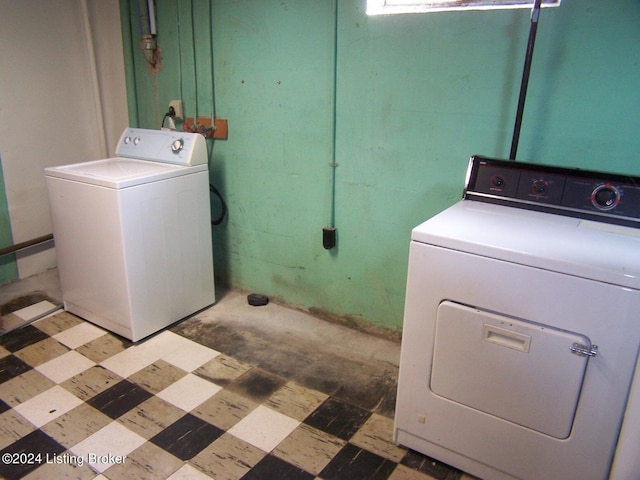 laundry area with washing machine and dryer