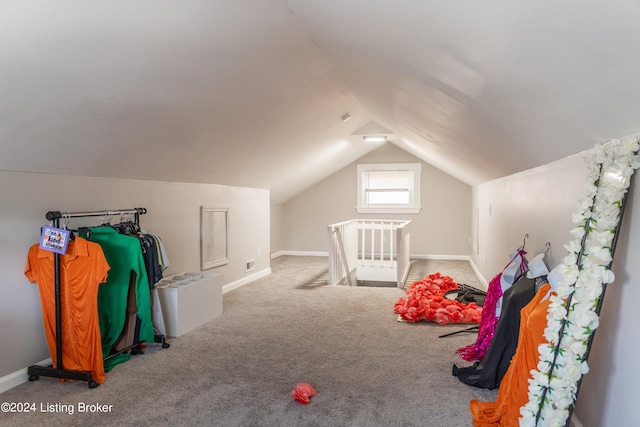 playroom with light carpet and lofted ceiling