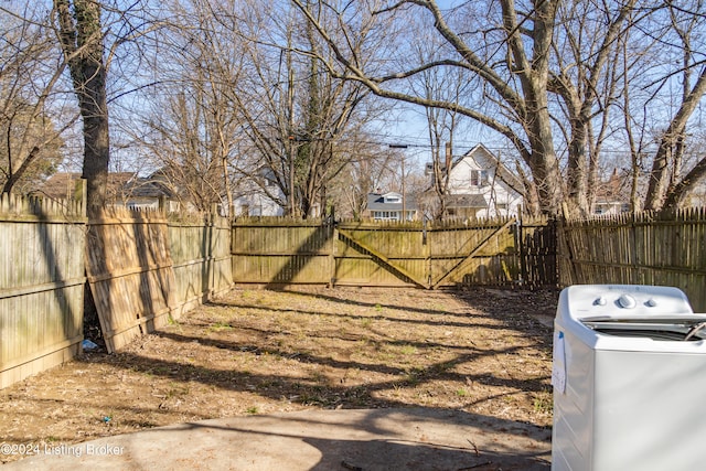 view of yard with washer / clothes dryer