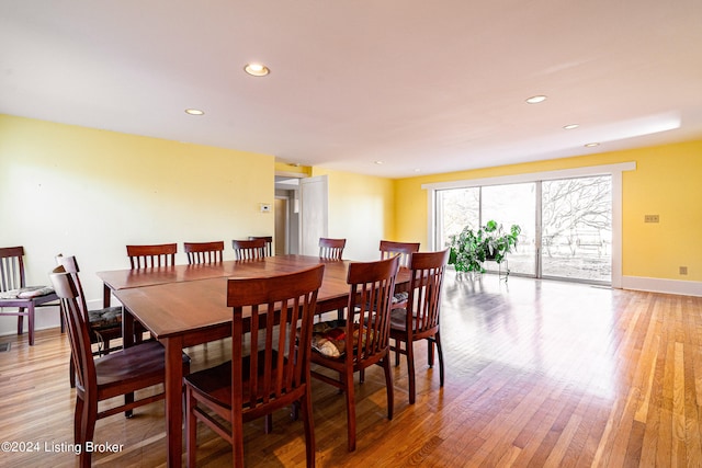 dining area with light wood-type flooring