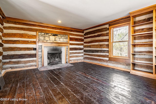 unfurnished living room with dark hardwood / wood-style floors