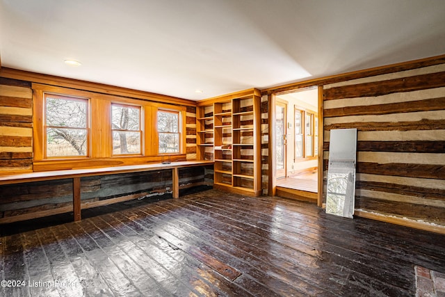 spare room with dark wood-type flooring