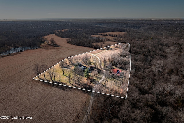 birds eye view of property with a rural view