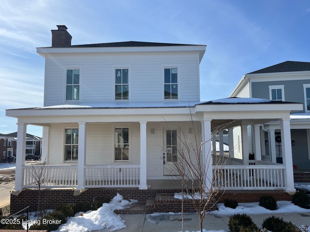 farmhouse featuring covered porch