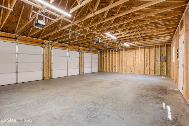 garage featuring a garage door opener