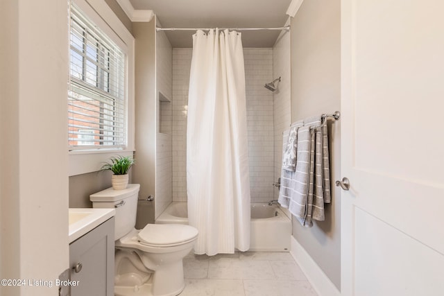 full bathroom with toilet, vanity, crown molding, tile floors, and shower / tub combo