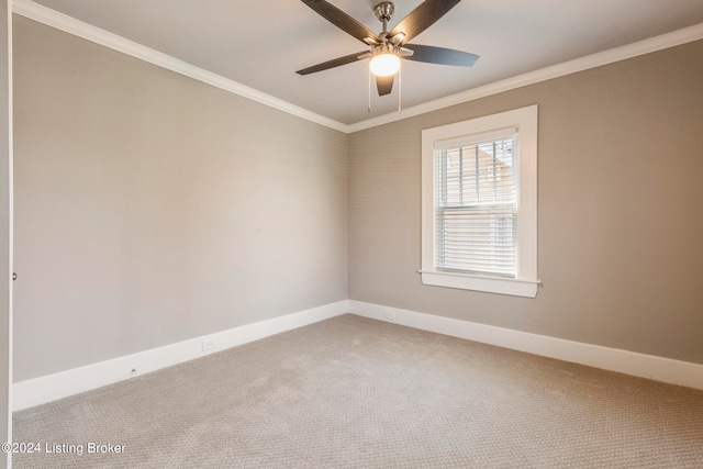 unfurnished room with ceiling fan, ornamental molding, and light carpet