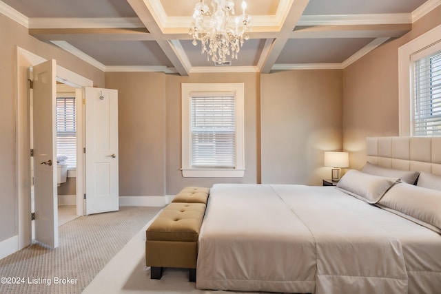 bedroom featuring coffered ceiling, light colored carpet, ornamental molding, and an inviting chandelier