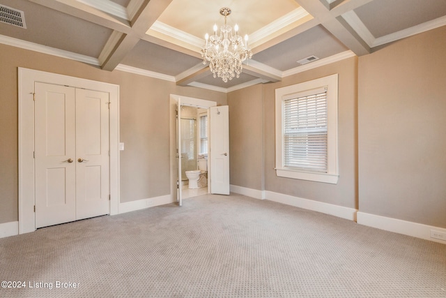 unfurnished bedroom featuring coffered ceiling, beamed ceiling, an inviting chandelier, crown molding, and light colored carpet