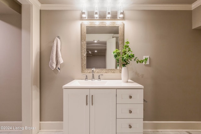 bathroom featuring vanity and ornamental molding