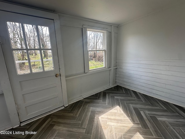 interior space featuring dark parquet floors