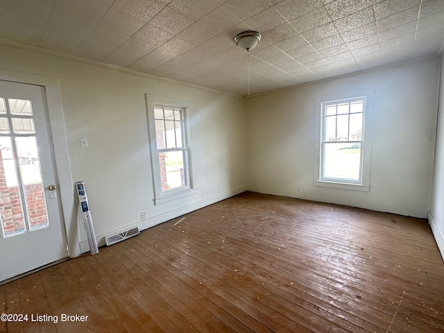 empty room with dark wood-type flooring