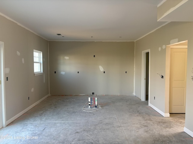 spare room with ornamental molding