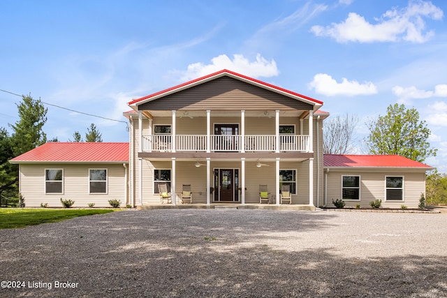 view of front of property with a balcony