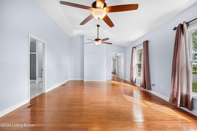 tiled spare room with ceiling fan and lofted ceiling