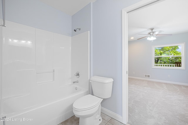 bathroom featuring ceiling fan, tile floors, toilet, and shower / bathtub combination