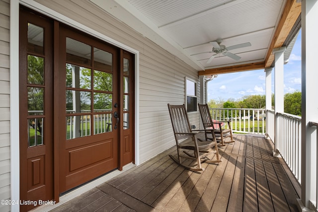 wooden deck with ceiling fan