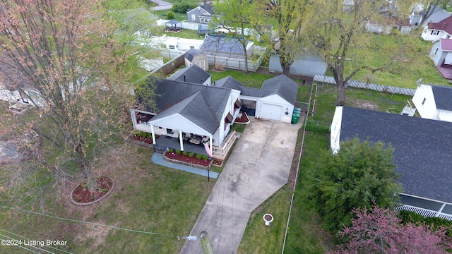 birds eye view of property with a residential view