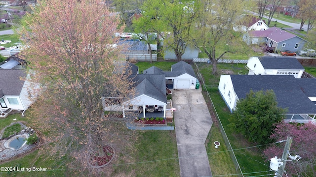 birds eye view of property with a residential view