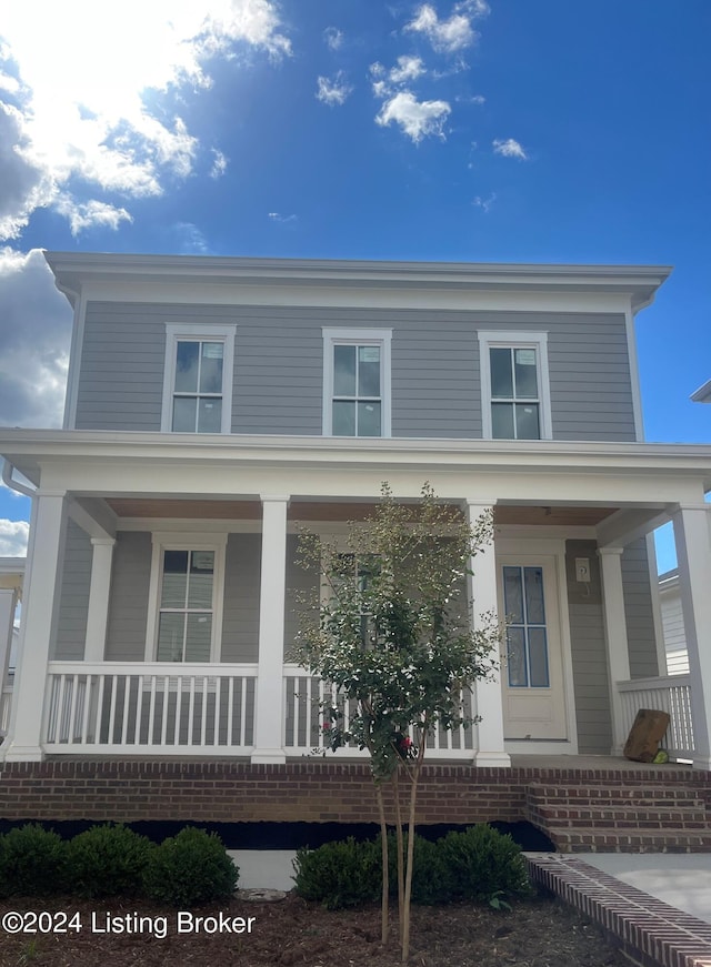 view of front of home featuring covered porch