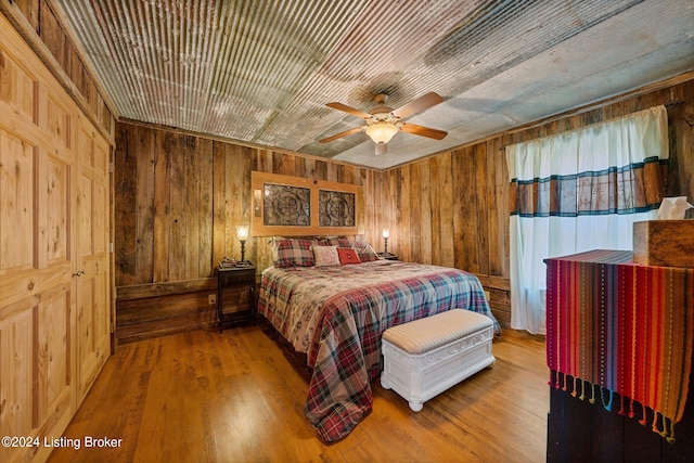 1478 Robbin Ln, Cub Run, KY 42729 - bedroom with wooden walls, wood finished floors, ceiling fan, and wood ceiling