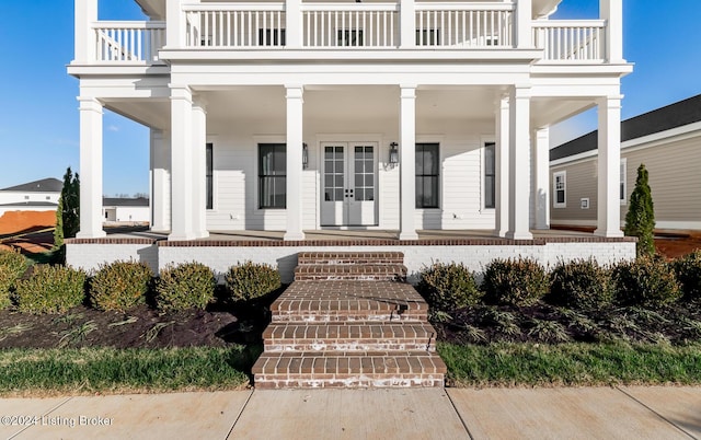 property entrance with a balcony