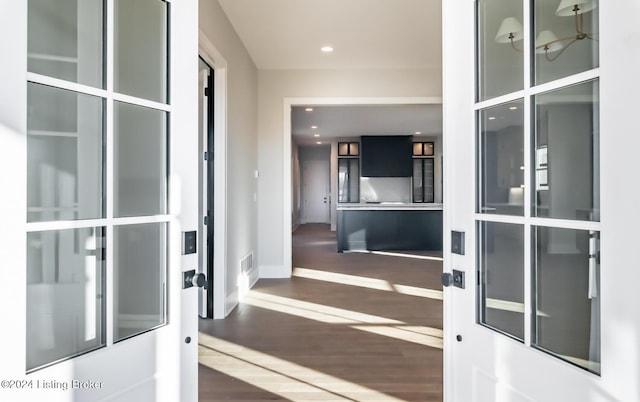 interior space with dark wood-type flooring