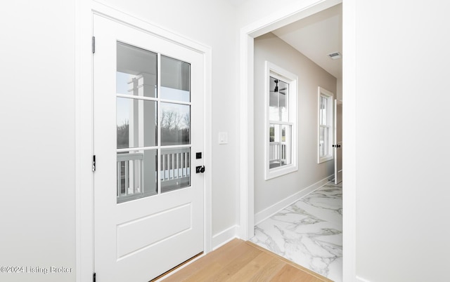 doorway featuring light wood-type flooring