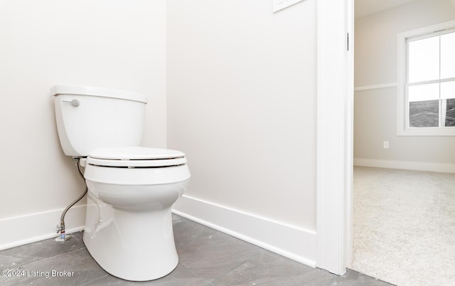 bathroom featuring toilet