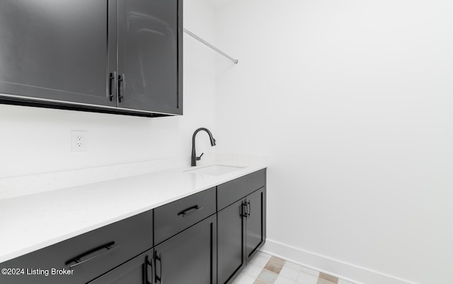 laundry room featuring sink