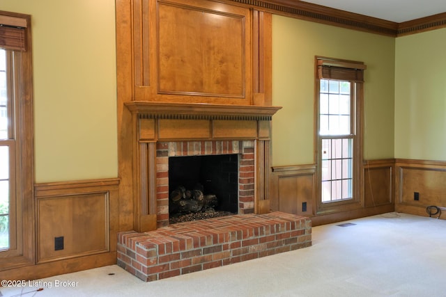 9602 Moorfield Cir, Louisville, KY 40241 - living room with carpet flooring, a wainscoted wall, a brick fireplace, and crown molding
