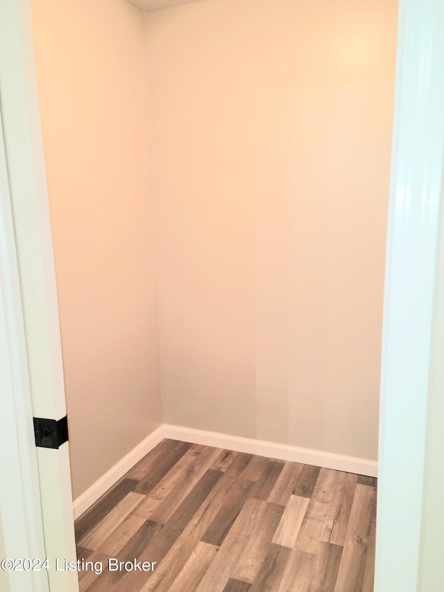 spare room featuring hardwood / wood-style floors