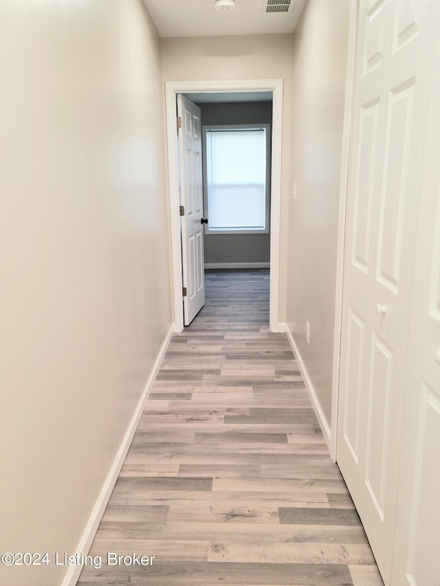 hall featuring light hardwood / wood-style floors