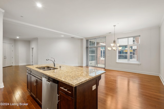 kitchen featuring dishwasher, a center island with sink, crown molding, wood-type flooring, and sink