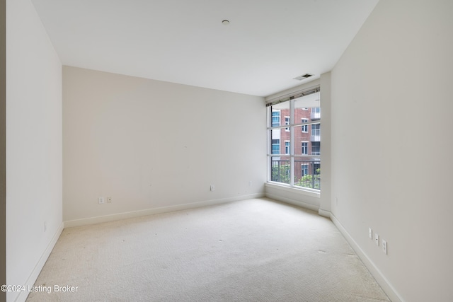 empty room featuring carpet floors