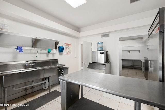 kitchen with light tile floors