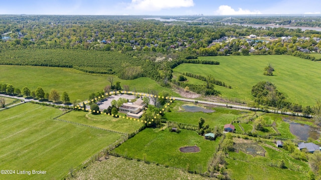 birds eye view of property featuring a rural view