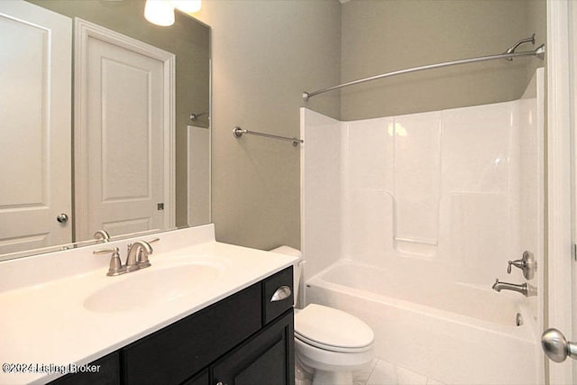 full bathroom featuring tile floors, toilet, shower / bathing tub combination, and vanity