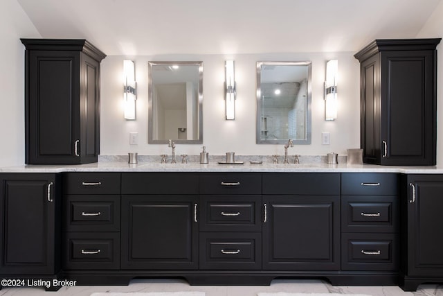 bathroom with walk in shower and vanity