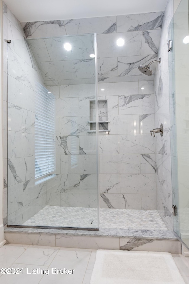 bathroom with an enclosed shower