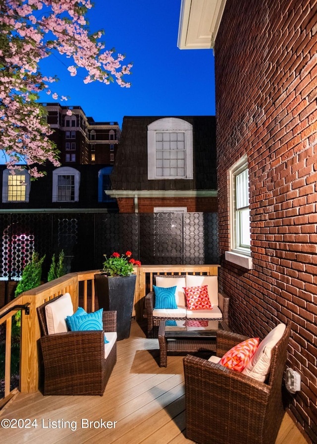 wooden deck featuring outdoor lounge area