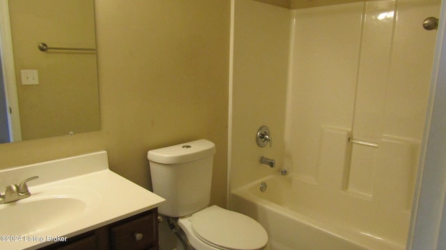 full bathroom featuring vanity with extensive cabinet space, toilet, and bathtub / shower combination